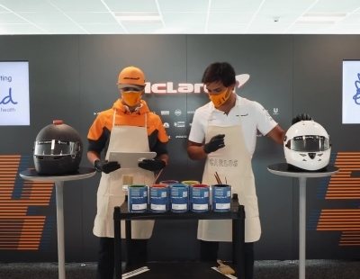 Carlos Sainz y Lando Norris pintan sus cascos por una causa benéfica