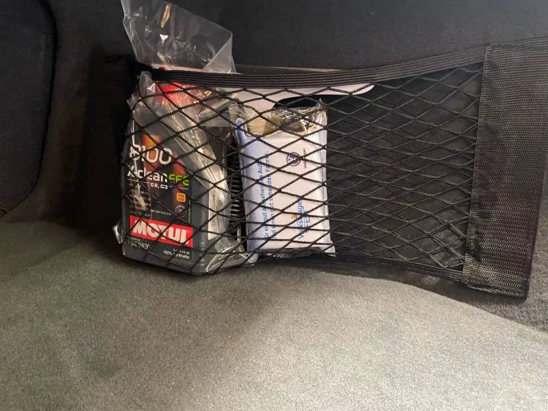 Todo sujeto en el maletero por menos de 3 euros con este accesorio de Aliexpress 2 Motor16 Organizador malla aliexpress