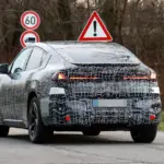 BMW iX4: SUV coupé eléctrico con 800V y carga de 400 kW avistado en Nürburgring