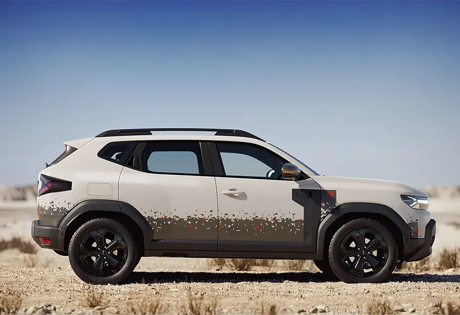 Dacia celebra la victoria en el Dakar con el Duster más aventurero y exclusivo de la historia 1 Motor16 2026 Dacia Duster Spirit of Sand. Imagen lateral.