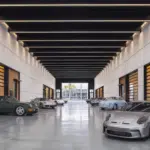 Porsche crea el garaje definitivo para millonarios: un club privado donde vivir, trabajar y exhibir sus joyas de cuatro ruedas